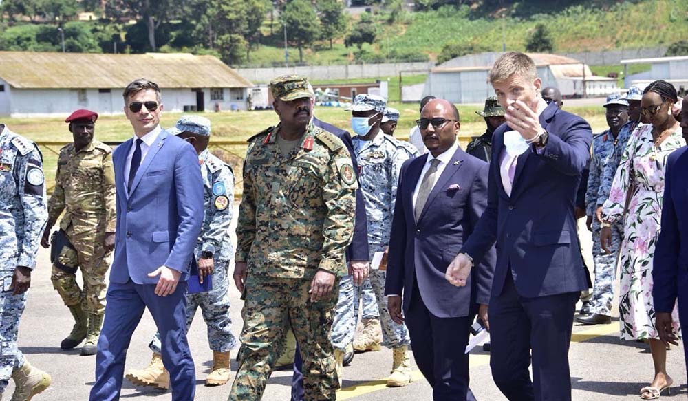 CDF General Muhoozi Kainerugaba and senior UPDF officers guided by Vladan Resner during inspection of L-39 Skyfox aircraft at Entebbe Air Base in Entebbe on Monday. (UPDF Photos)