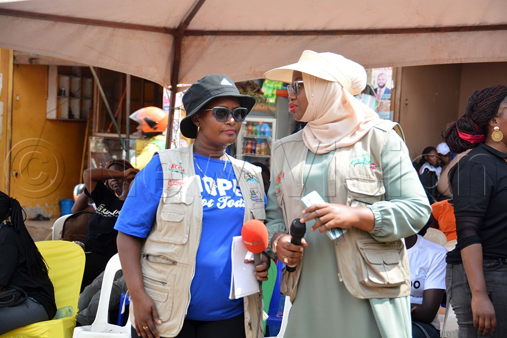 The KCCA executive director, Hajat Sharifah Buzeki (right), interacts with the director of public health, Dr Sarah Zalwango, after the cleaning exercise at Kisenyi III in Kampala on Saturday, November 29, 2025. (Photo by Francis Emorut)