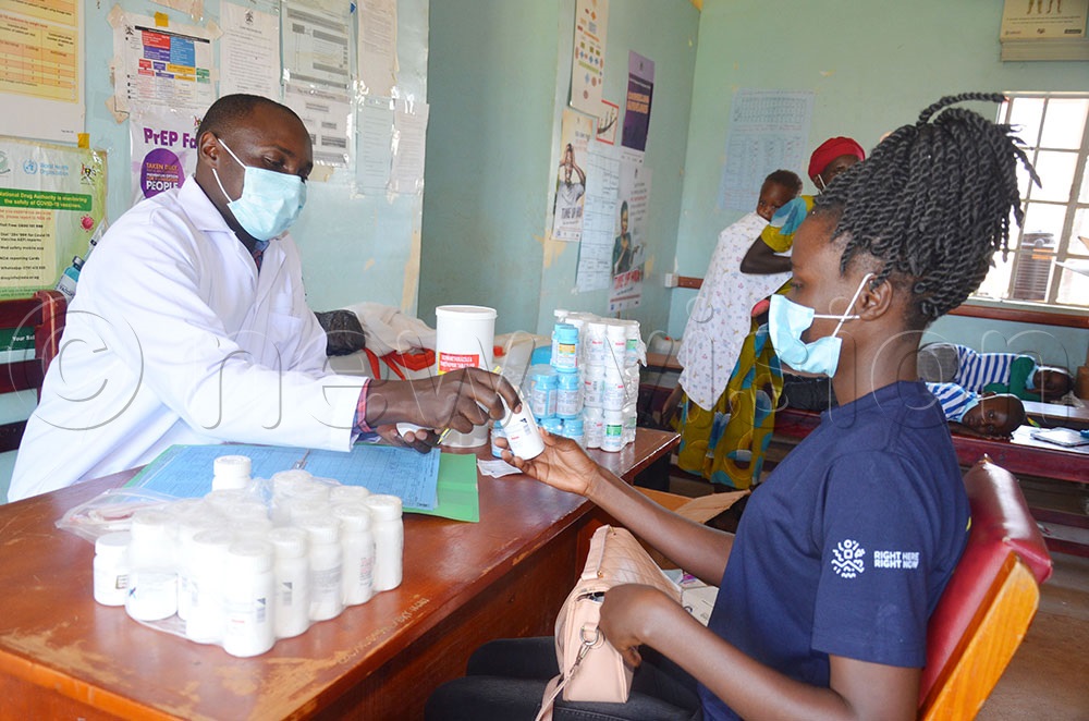  A lady receiving ARVs at Bukuya Health Centre IV. (Photo by Agnes Kyotalengerire)