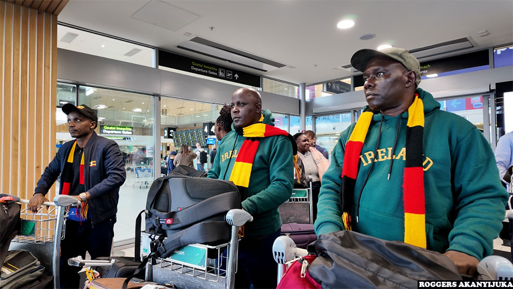 From the left, teachers  Richard Begura and Elisa Mfitundinda together with William Mwesigwa from the Embassy of Ireland in Uganda arriving at Dublin Airport