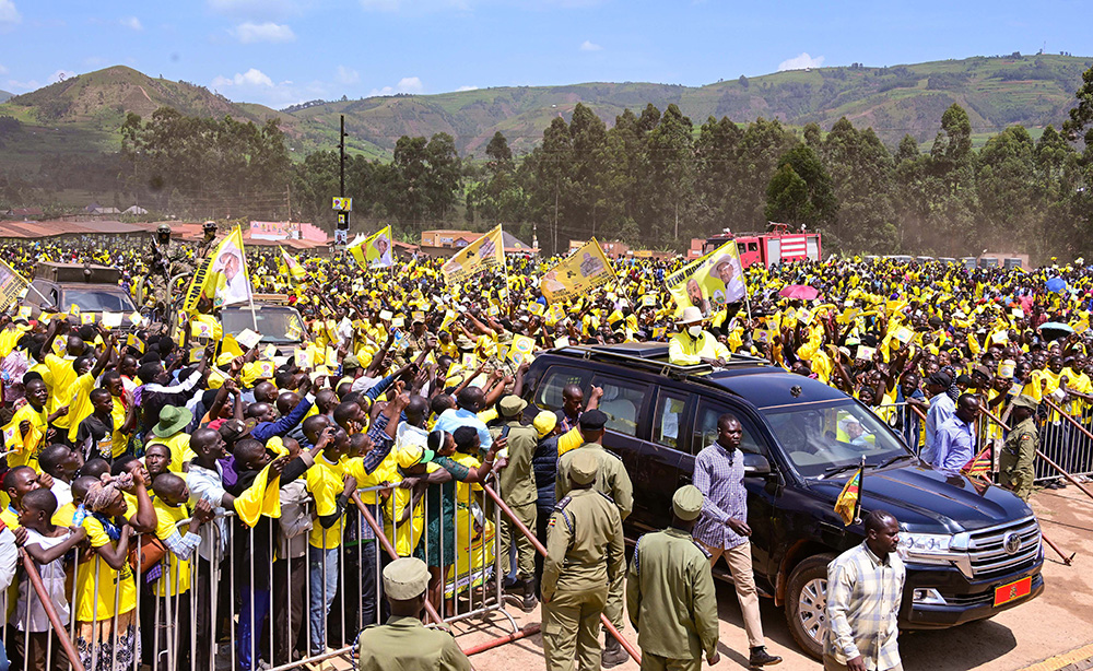 President Museveni waves to his supporters as he arrives at Rusherebeya market grounds in Rwamucucu sub-county, Rukiga district to address his campaign rally. (PPU Photo)