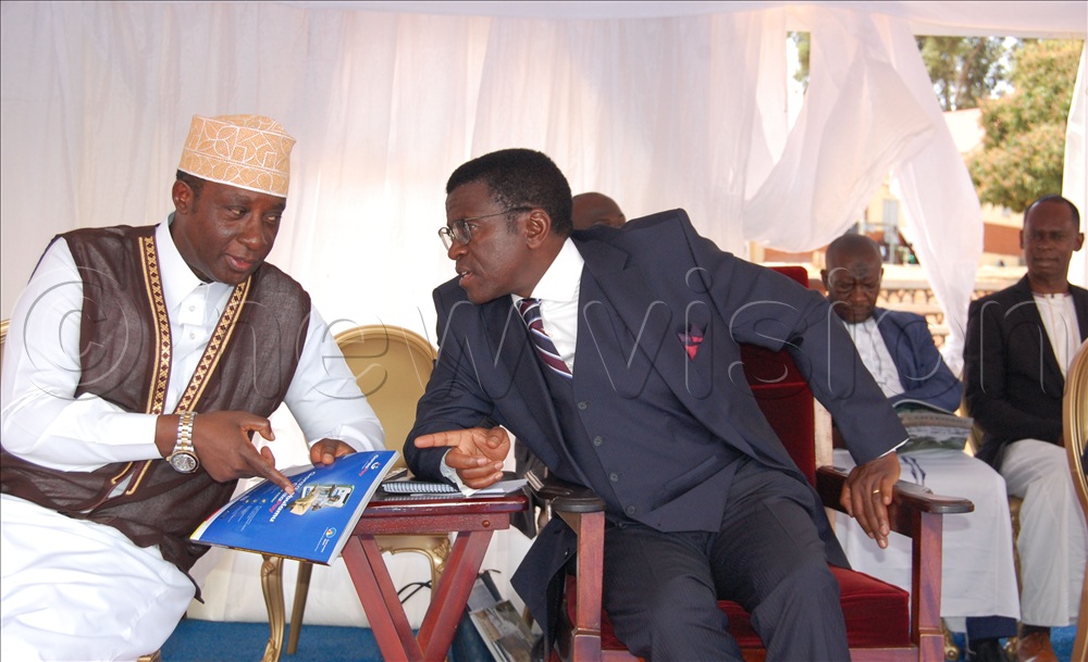 Prince Dr. Kassim Nakibinge (left) shares a moment with the Katikkiro of Buganda, Charles Peter Mayiga during the function.