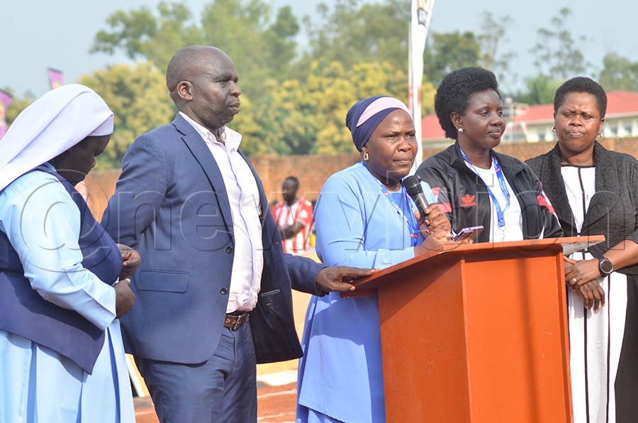 Hajjat Zulaika Nabukeera, President of the Association of Secondary School Headteachers of Uganda (ASSHU), addressing participants during the opening ceremony at Sacred Heart Girls' Secondary School grounds in Gulu