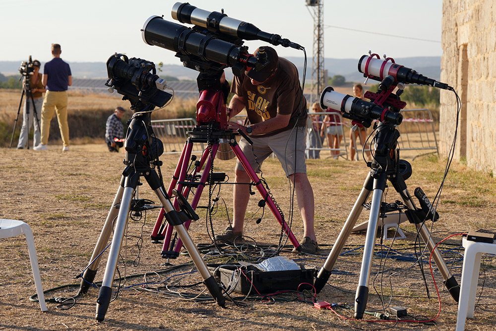 Researchers from San Francisco's Exploratorium museum carry out preparations for the global live broadcast of the upcoming August 12 total solar eclipse, in the abandoned village of Villalibado, near Burgos, northern Spain, on August 10, 2026. (AFP)