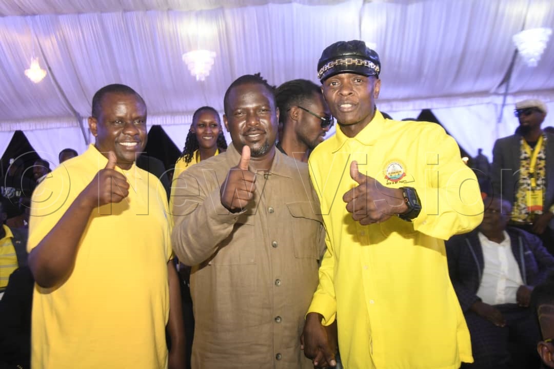 State minister for children and youth affairs, Balaam Barugahara (Left), NRM Secretary General Richard Todwong (Centre), and musician Jose Chameleone (Right) pose for a photo moment.
