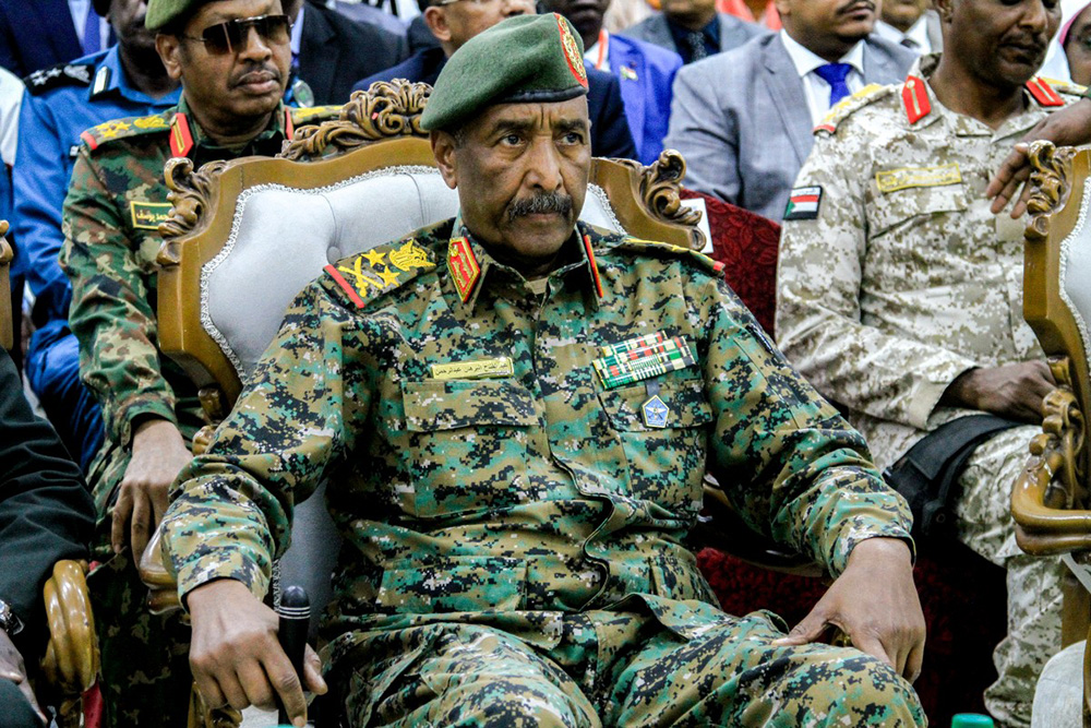 Sudan's army chief General Abdel Fattah al-Burhan attends the inauguration of an initiative to support the families of victims killed and injured in the ongoing civil war, in Port Sudan on April 26, 2025. (Photo by Ebrahim Hamid / AFP)