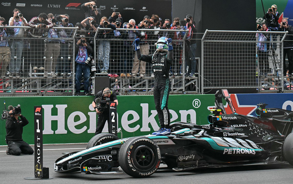 Mercedes' Italian driver Kimi Antonelli celebrates his victory after the Formula One Chinese Grand Prix at the Shanghai International Circuit in Shanghai on March 15, 2026.