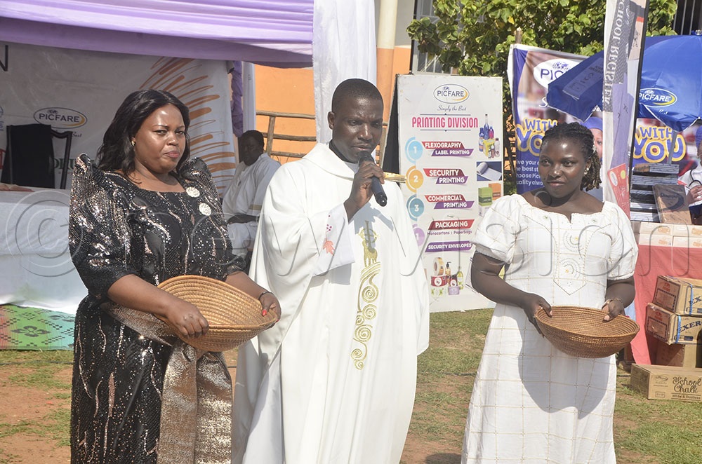 Fr. Deogratious Kiibi, who led the mass, prayed for Primary Seven pupils, including the survivors. He emphasised daily prayers in the school, saying it will play a big role in fighting the enemies of the school. (Credit: Nicholas Kajoba)