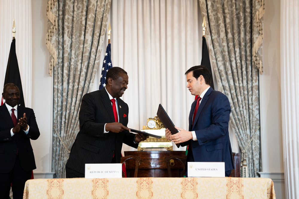 US Secretary of State Marco Rubio (R) and Kenyan Prime Cabinet Secretary Musalia Mudavadi (L) participate in a Health Framework of Cooperation signing ceremony at the State Department in Washington, DC on December 4, 2025. 