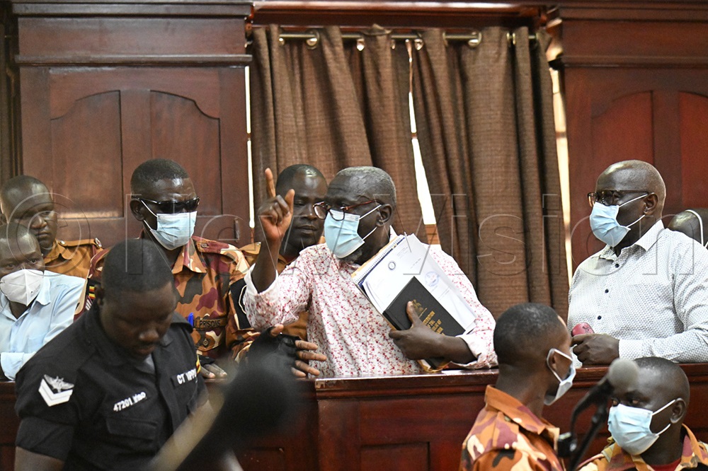 Besigye repeatedly interrupted the proceedings, shouting that the court should “stop this nonsense.” (Credit: Maria Wamalal)