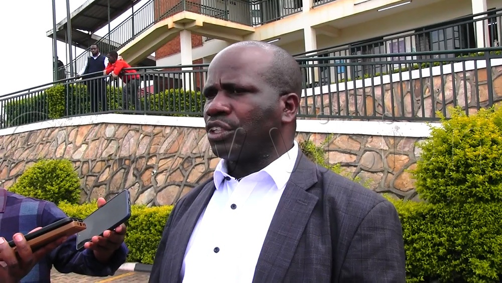 NRM Flagbearer Asgario Turyagyenda speaking to the press. (Photo by Nelson Ahimbisibwe)