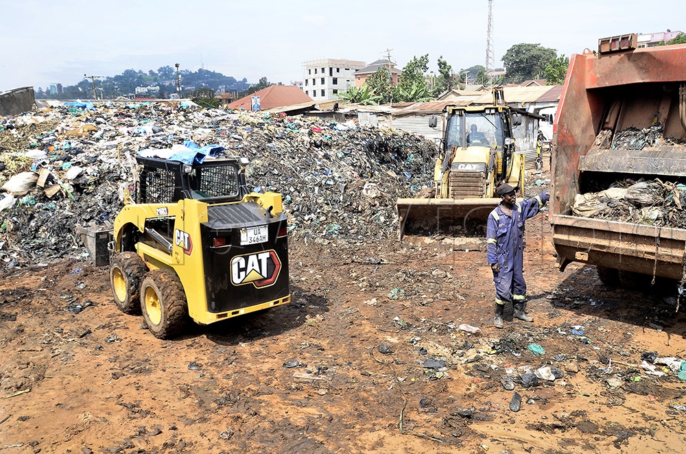 Kampala Capital City Authority (KCCA) tractors remove the garbage during Executive Director of KCCA, Sharifah Buzeki’s cleanup exercise at Namuwongo in Makindye Division, Kampala, on 6 June 6, 2026. (Photo by Ronnie Kijjambu)